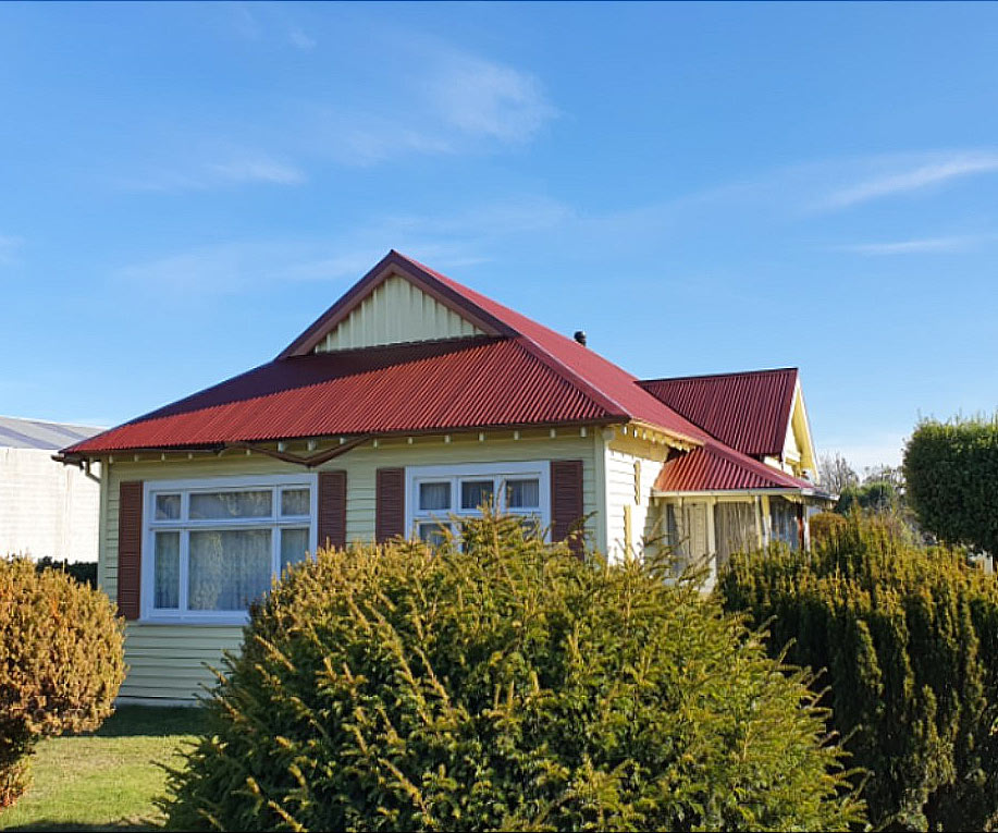 Concrete tile roof - After re Replacement with Corrugated Iron